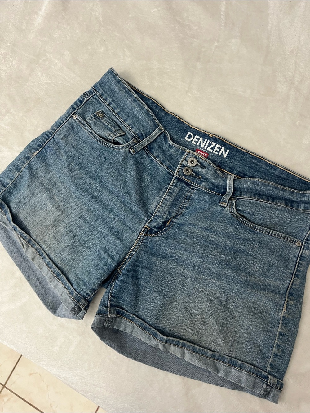 Denizen from Levi's light blue denim shorts (slight brown discoloration)